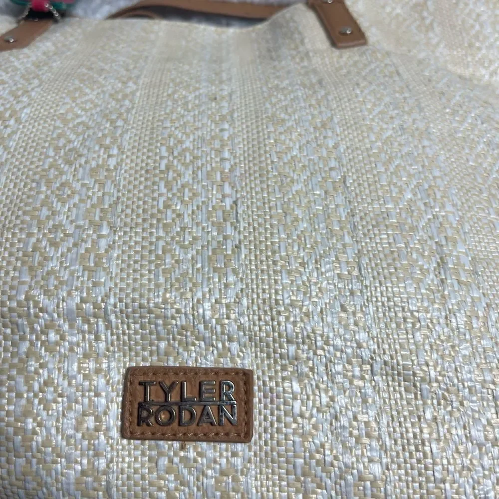 Tyler Rodman beige woven large tote with tan faux leather trim and straps .